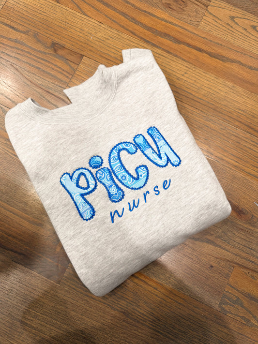 Blue Lace PICU nurse Crewneck