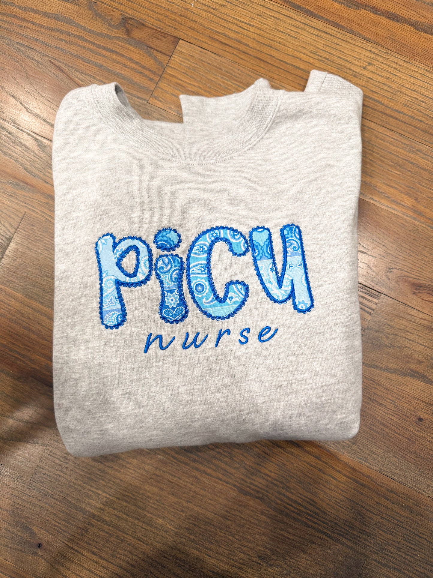Blue Lace PICU nurse Crewneck